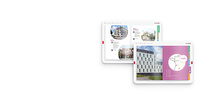 Deux tablettes affichant une brochure immobilière avec des onglets de couleur sur le bord des pages